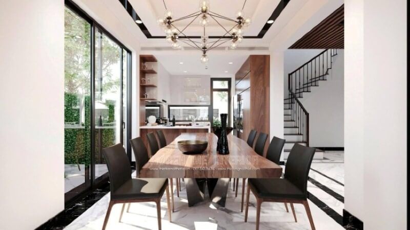 Trong thiết kế nội thất phòng ăn biệt thự theo xu hướng hiện đại, sự xuất hiện của đèn không chỉ để chiếu sáng mà còn có hiệu ứng thị giác kích thích sự thích thú mỗi khi các thành viên sum vầy. Trong đây kts Morehome đã sử dụng ý tưởng dùng đèn thả dạng lục giác với 6 đỉnh tựa như bông hoa đang bung nở khoe sắc, và sẽ đẹp hơn nếu thể hiện đúng thời điểm, và hiển nhiên trong mỗi gia đình hiện đại, trong 1 ngày làm việc bận rộn thì bữa tối lại là bữa chính và quan trọng nhất để nghệ thuật ánh sáng được phát huy tác dụng của mình.